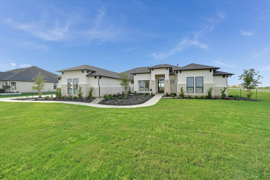 Representative exterior photo of a completed home built from the Bandera II by Giddens Homes in Leander Estates, Leander, TX (Image 9).