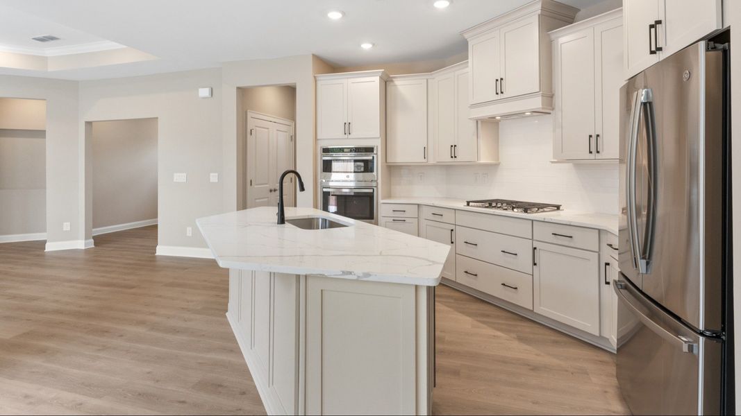 Furnished interior view inside a new home in The Courtyards at Bailey Farms, Dacula (Image 10).