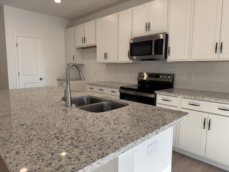 Furnished interior view inside a new home in East Main Townes, Spartanburg (Image 6).