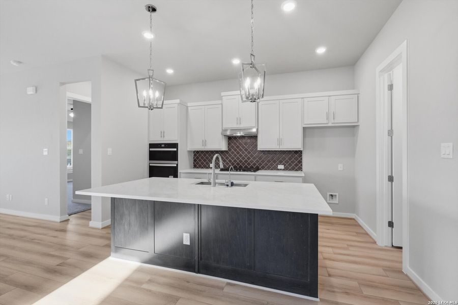 Furnished interior view inside a new home in Windsong, Boerne (Image 5).