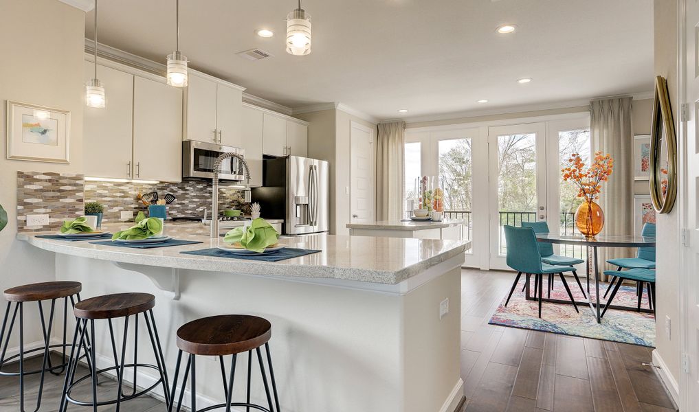 Kitchen overlooks dining area