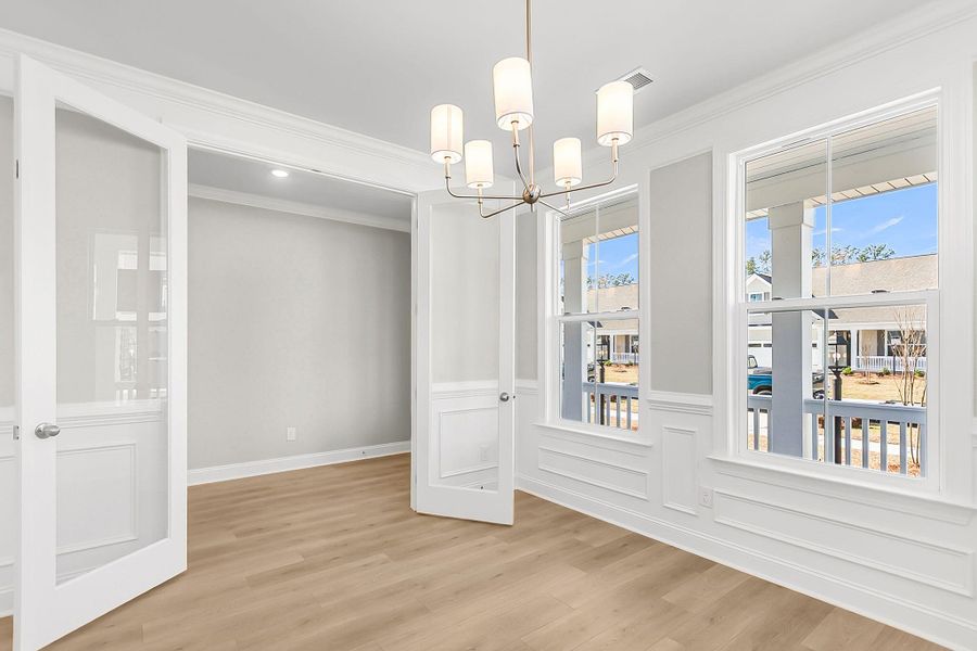 Spacious, unfurnished interior of a new home in Tidewater at Lakes of Cane Bay, Summerville (Image 31).