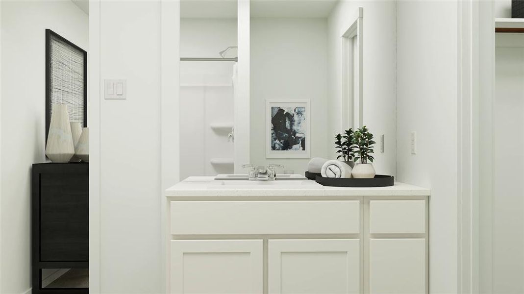 Bathroom with walk in shower and vanity