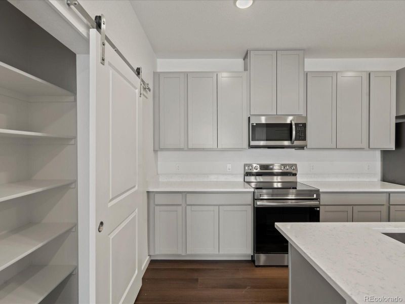 Furnished interior view inside a new home in Gateway Commons, Denver (Image 6).