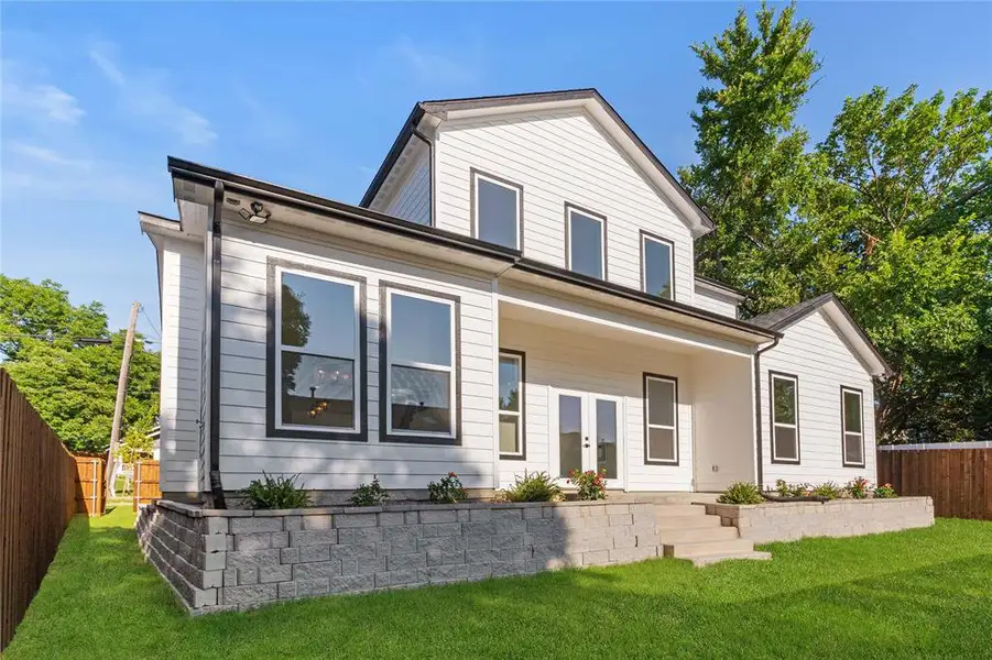 Back of property with french doors