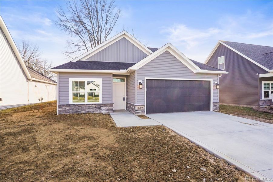 Front exterior of a new home in , Grand Junction, CO, highlighting curb appeal (Image 21).