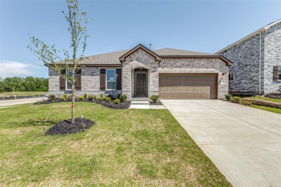 Front exterior of a new home in Heartland Signature, Crandall, TX, highlighting curb appeal (Image 12). Front exterior of a new home in Heartland Signature, Crandall, TX, highlighting curb appeal (Image 12).