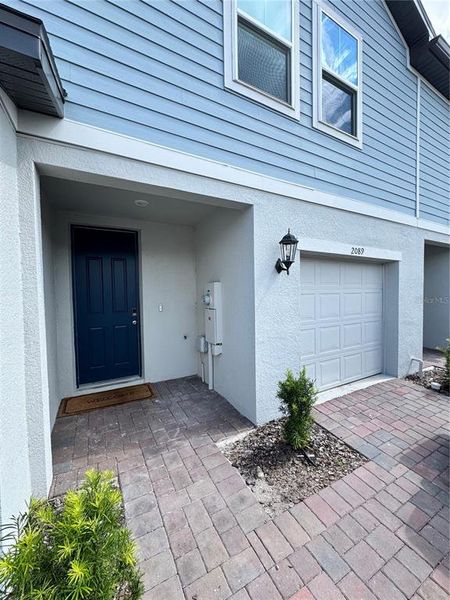 Front exterior of a new home in , Orlando, FL, highlighting curb appeal (Image 1).