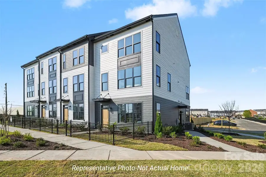 Condo located in Charlotte, NC showcasing its design and architecture (Image 4).