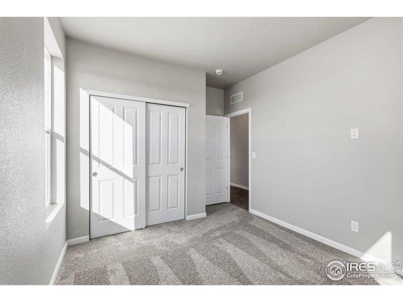 Spacious, unfurnished interior of a new home in Cordovan, Longmont (Image 23).