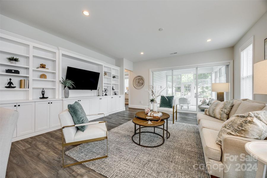 Elegant living area with custom built-in cabinetry.