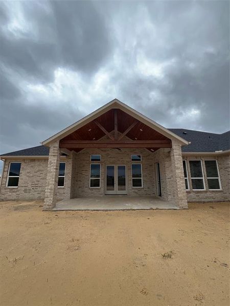 Back of property featuring a patio area