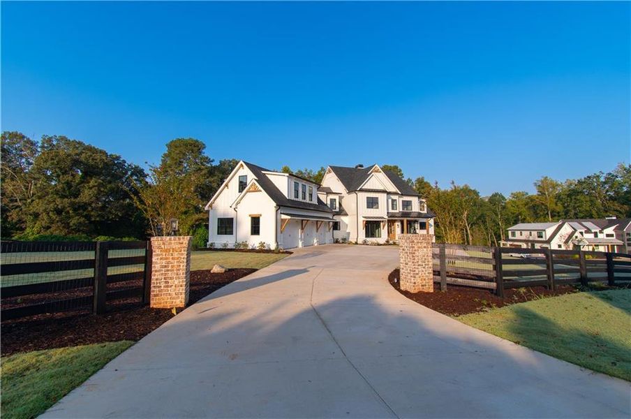 Front exterior of a new home in , Canton, GA, highlighting curb appeal (Image 27).