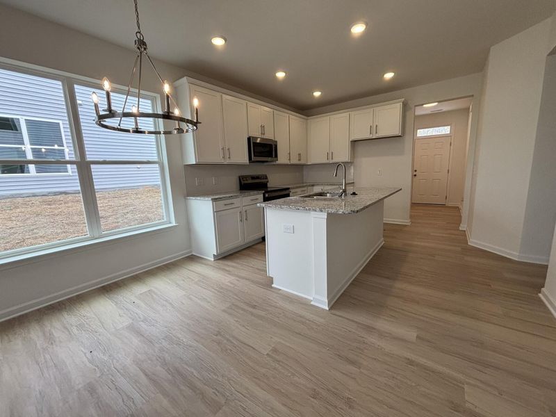 Furnished interior view inside a new home in CraigStone, Woodruff (Image 5).