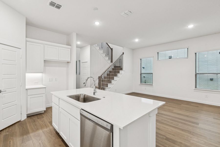 Kitchen in the Picasso II home plan by Trophy Signature Homes – REPRESENTATIVE PHOTO