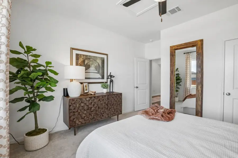 Representative furnished interior of a home built from the Sparrow by Taylor Morrison in Longview, Del Valle (Image 32).