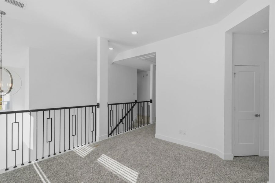Representative unfurnished interior of a home built from the Chantilly 2 by Chesmar Homes in Sienna Chateau, Missouri City (Image 33).
