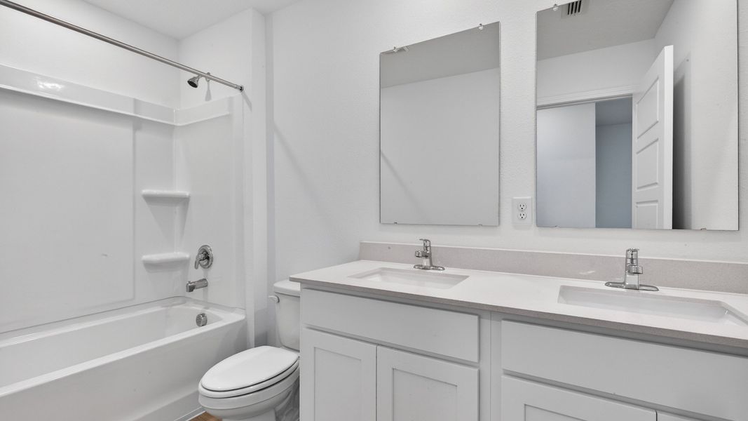 Representative furnished interior of a home built from the Elston+ by D.R. Horton in Diamond Springs, Jacksonville (Image 9).