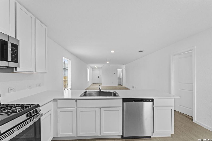 Furnished interior view inside a new home in Spring Grove, San Antonio (Image 6).