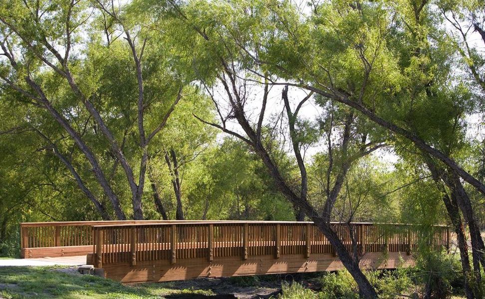 Front exterior of a new home in Heartland, Crandall, TX, highlighting curb appeal (Image 1). Front exterior of a new home in Heartland, Crandall, TX, highlighting curb appeal (Image 1).