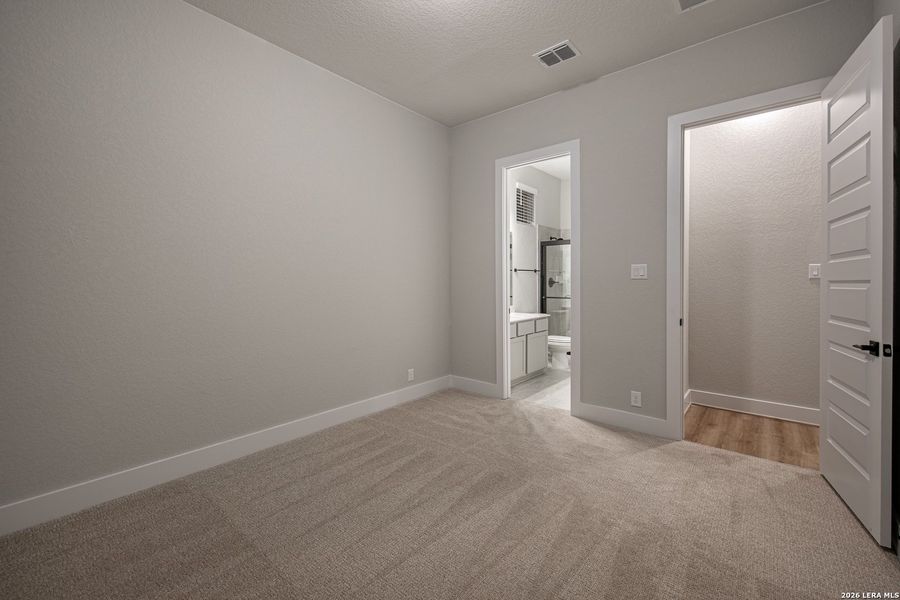 Spacious, unfurnished interior of a new home in The Reserve at Potranco Oaks, Castroville (Image 28).