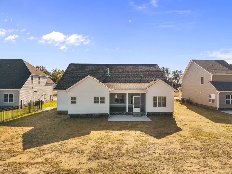 Exterior details and patio area of a home in The Preserve at Langston, Winterville (Image 33).