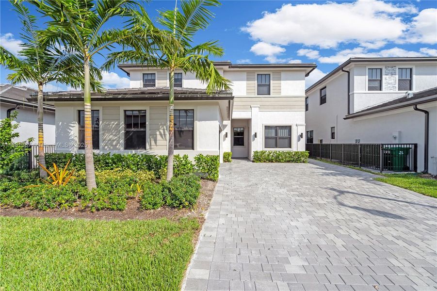 Front exterior of a new home in , Miramar, FL, highlighting curb appeal (Image 21).