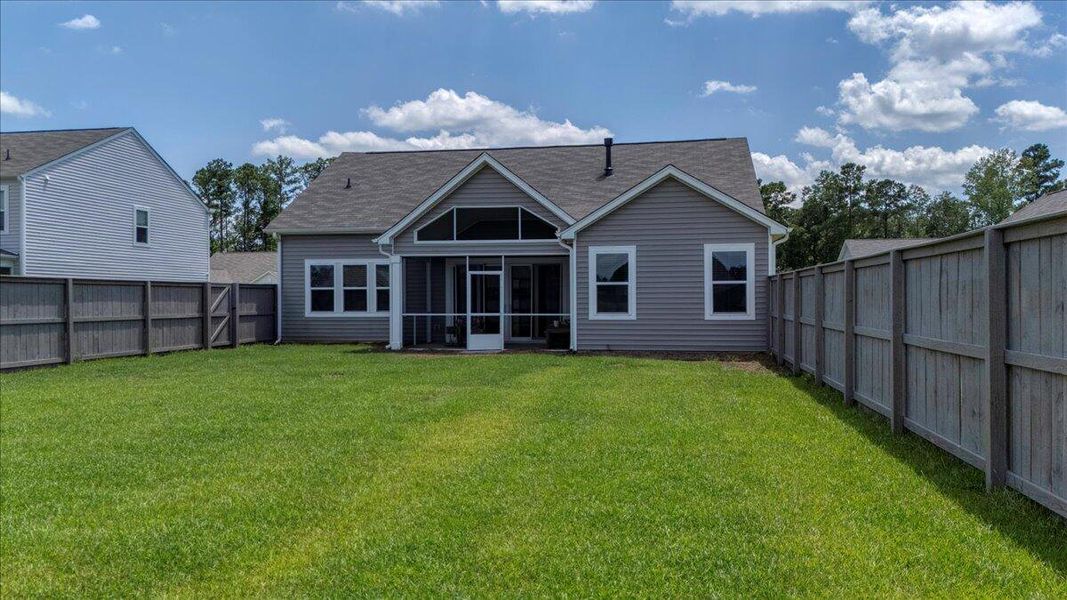 Front exterior of a new home in French Quarter Creek, Huger, SC, highlighting curb appeal (Image 21).