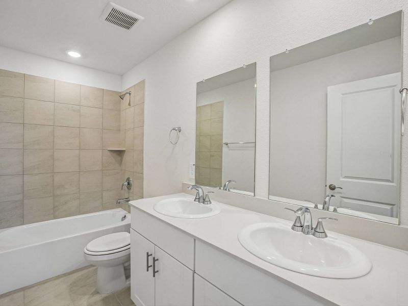 Furnished interior view inside a new home in Parks at Foster Crossing - Signature Series, Anna (Image 10).