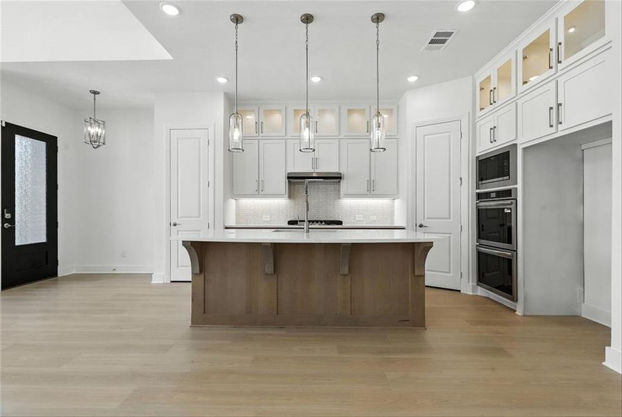 Furnished interior view inside a new home in Walsh: Townhomes - The Patios, Aledo (Image 9). Furnished interior view inside a new home in Walsh: Townhomes - The Patios, Aledo (Image 9).
