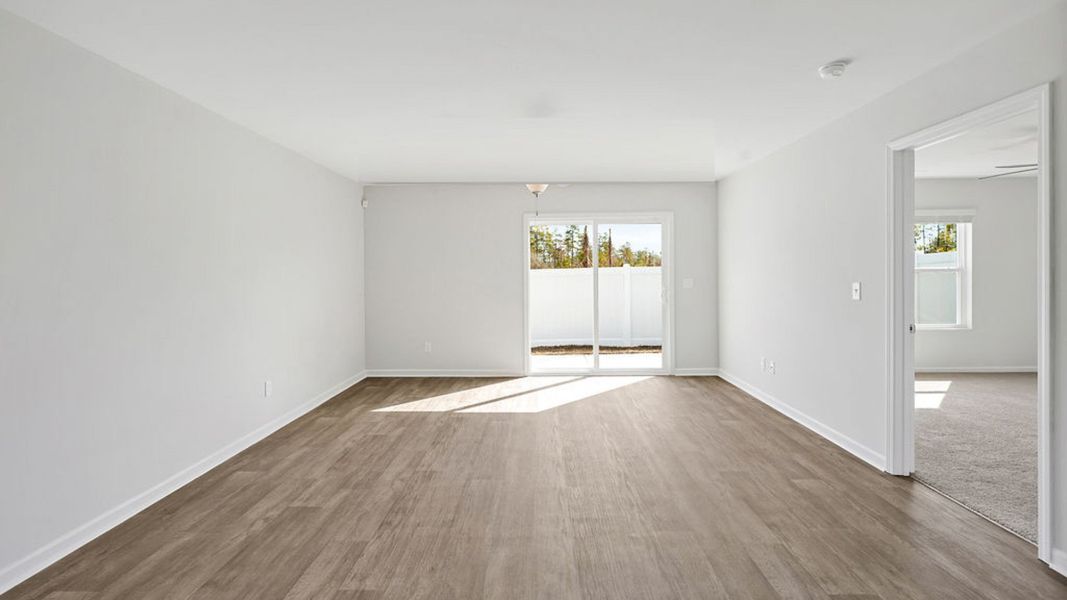 Representative unfurnished interior of a home built from the BAYSHORE by D.R. Horton in Indigo Preserve Townhomes, Leland (Image 16).