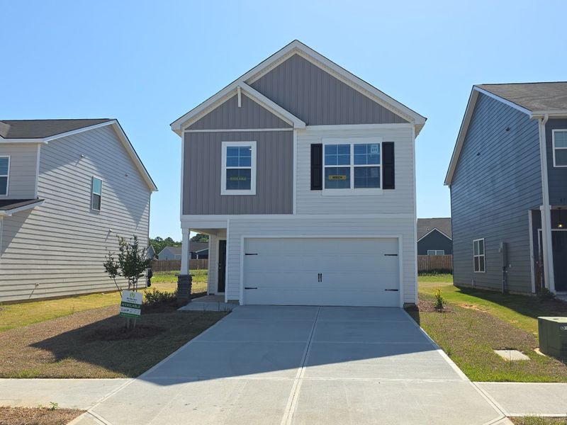 Front exterior of a new home in Rivers Crossing, Aiken, SC, highlighting curb appeal (Image 2). Front exterior of a new home in Rivers Crossing, Aiken, SC, highlighting curb appeal (Image 2).