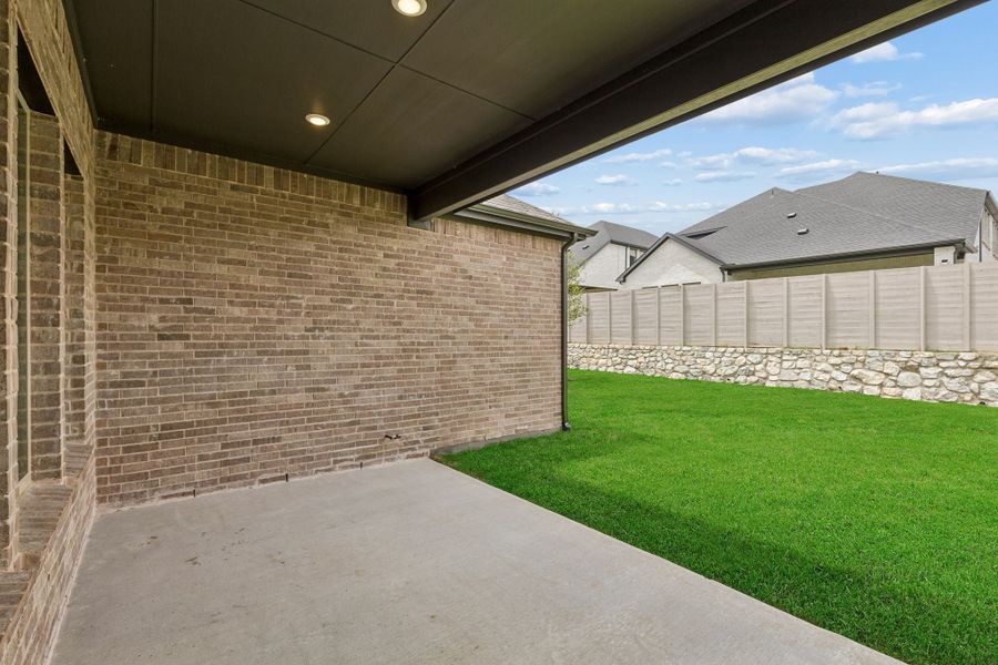 Exterior details and patio area of a home in Painted Tree Lakeside, McKinney (Image 3).