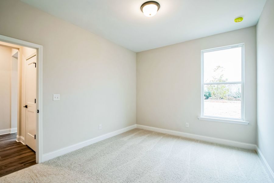 Representative unfurnished interior of a home built from the Warren by UnionMain Homes in Austin Springs, Bethlehem (Image 22).