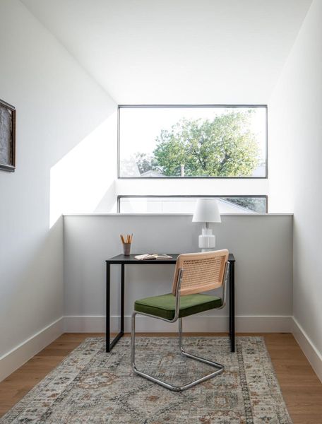 Office nook featuring light wood-style floors