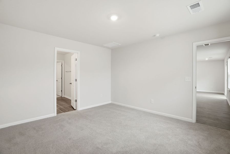 Representative unfurnished interior of a home built from the Spruce L by McGuinn Homes in Sibley Village, Sumter (Image 20).