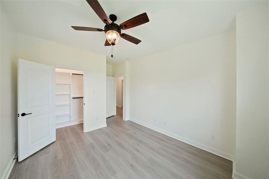 Second floor bedroom with walk in closet.