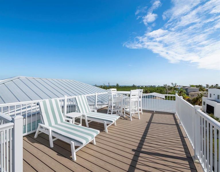 Exterior details and patio area of a home in , Longboat Key (Image 21).