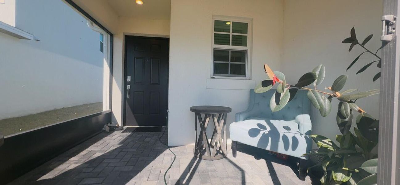 Exterior details and patio area of a home in , Palm Bay (Image 3). Exterior details and patio area of a home in , Palm Bay (Image 3).