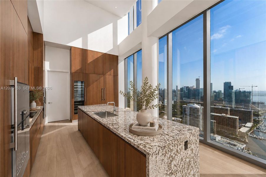 Kitchen. UNA Residences Brickell. One or more photos have been virtually staged. Kitchen. UNA Residences Brickell. One or more photos have been virtually staged.