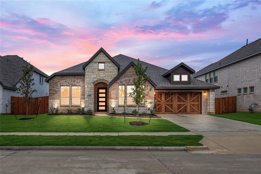 Front exterior of a new home in The Oaks, Red Oak, TX, highlighting curb appeal (Image 19). Front exterior of a new home in The Oaks, Red Oak, TX, highlighting curb appeal (Image 19).