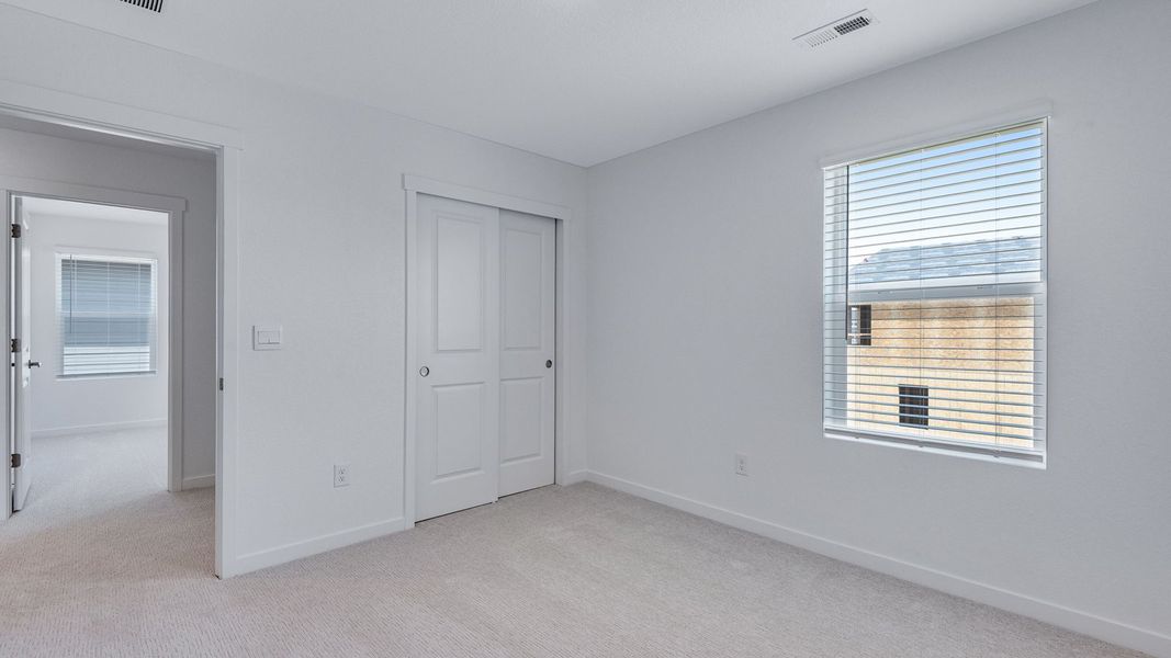Spacious, unfurnished interior of a new home in Prairie Song, Windsor (Image 27).