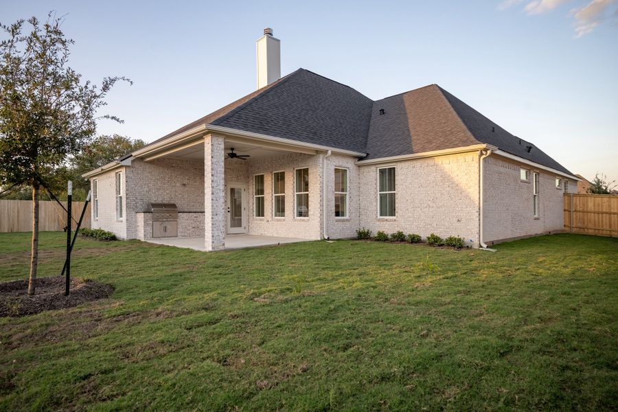 Exterior details and patio area of a home in Greens Prairie Reserve, College Station (Image 31). Exterior details and patio area of a home in Greens Prairie Reserve, College Station (Image 31).