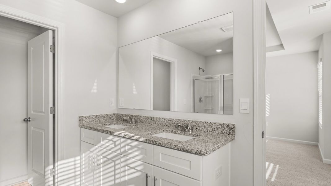 Representative furnished interior of a home built from the Somerset by D.R. Horton in Highland Hills, Graniteville (Image 7).