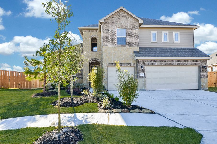 Representative exterior photo of a completed home built from the Floor Plan 2922 by Colina Homes in Grand Magnolia, Magnolia, TX (Image 21).