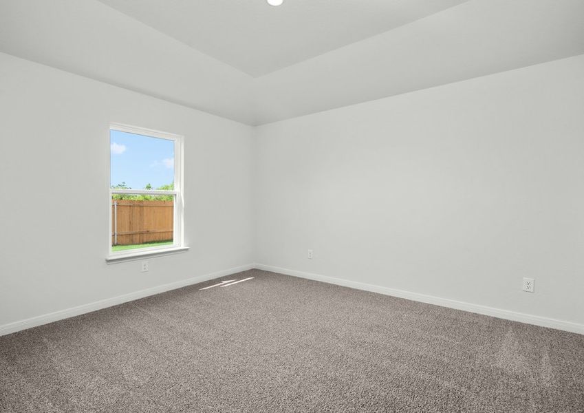 The master bedroom has plenty of space for large furniture.