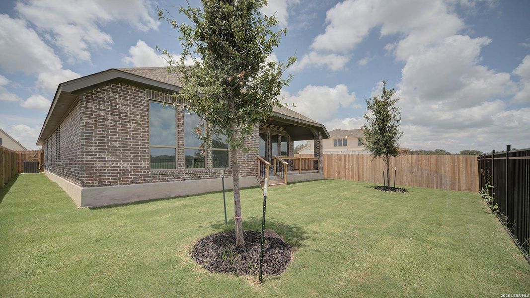 Exterior details and patio area of a home in Alsatian Oaks, Castroville (Image 3).