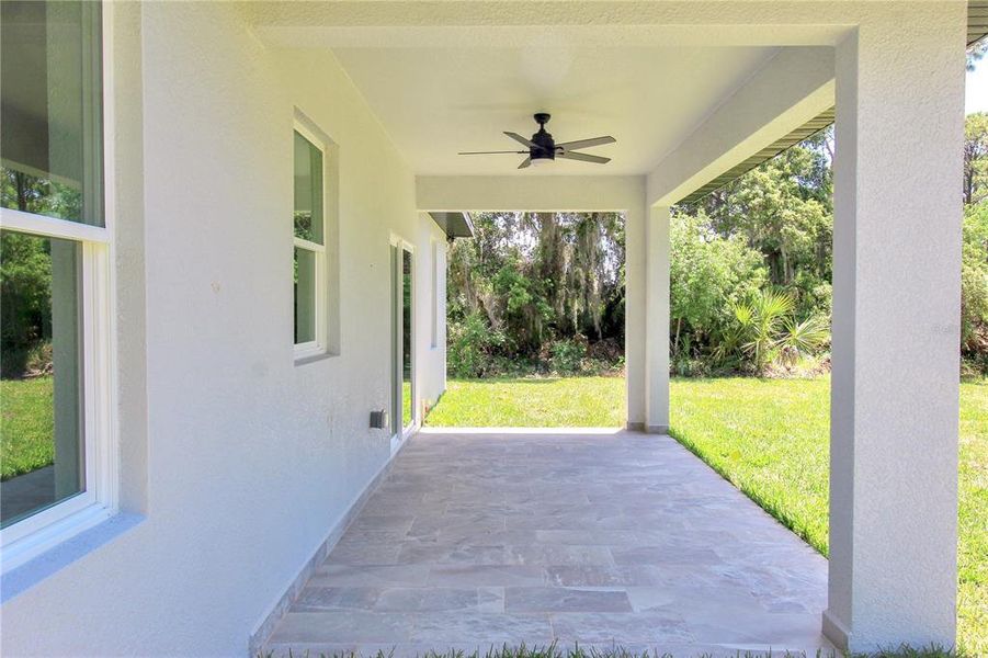 Exterior details and patio area of a home in , Sebring (Image 3).