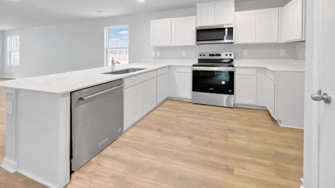 Furnished interior view inside a new home in Saddle Trace, Lewisburg (Image 6).