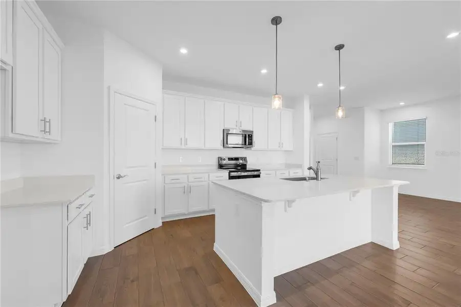 Furnished interior view inside a new home in Oakfield Trails, Parrish (Image 6).
